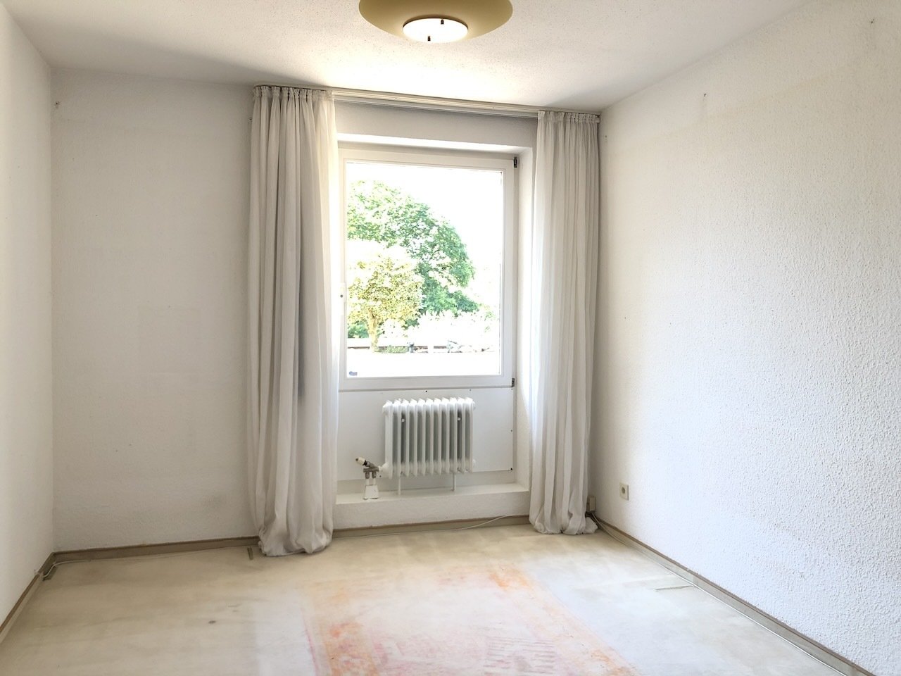 Attraktive Terrassen-Wohnung mit zwei Tiefgaragenstellplätzen in beliebter Lage