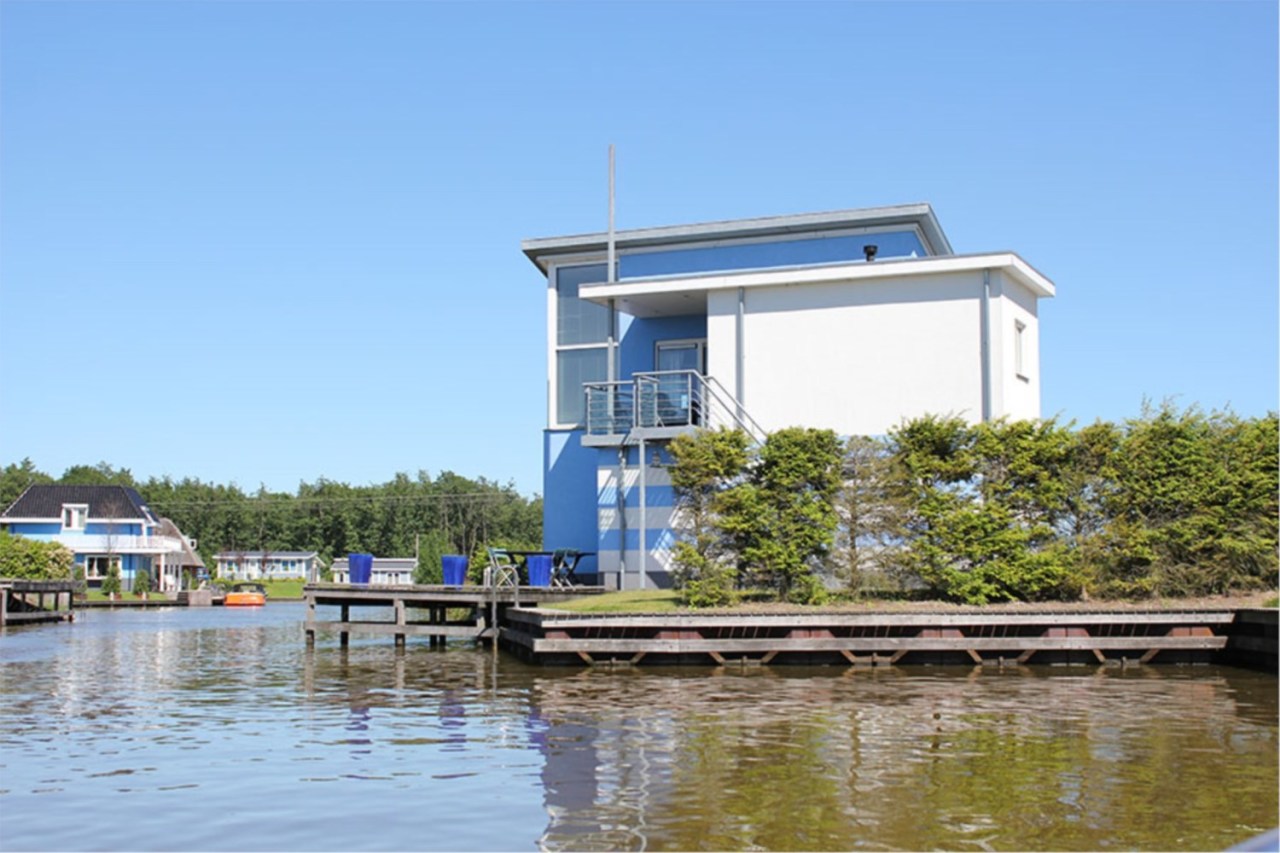 Modernes Ferienhaus mit maritimen Flair und eigenem Bootsanleger